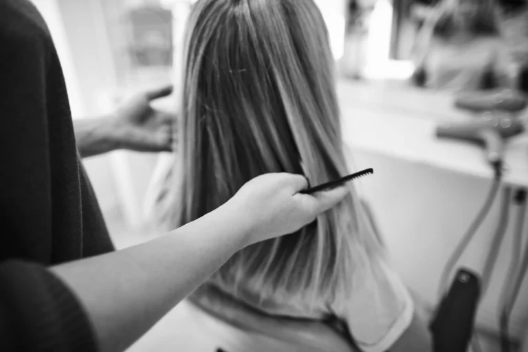 woman-getting-her-hair-cut-by-a-salon-hairstylist-2021-08-26-17-26-24-utc-modified-min